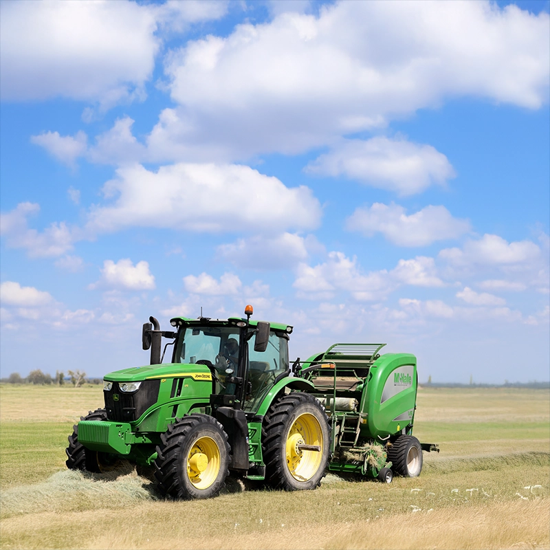 a green tractor in a field